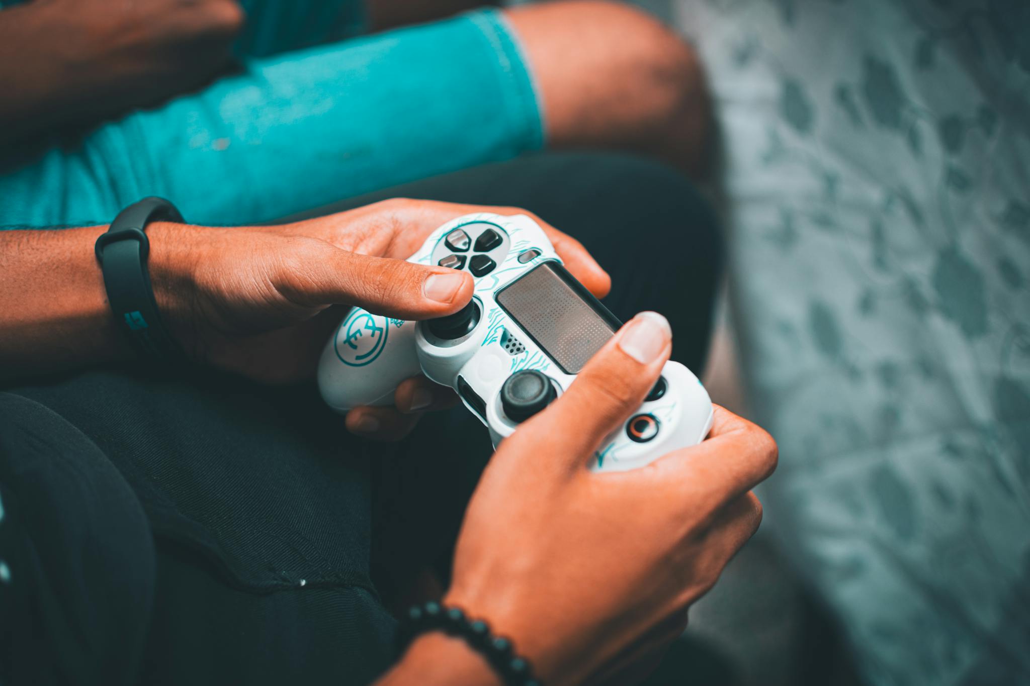 Close Up Of Hands Holding A Gaming Controller